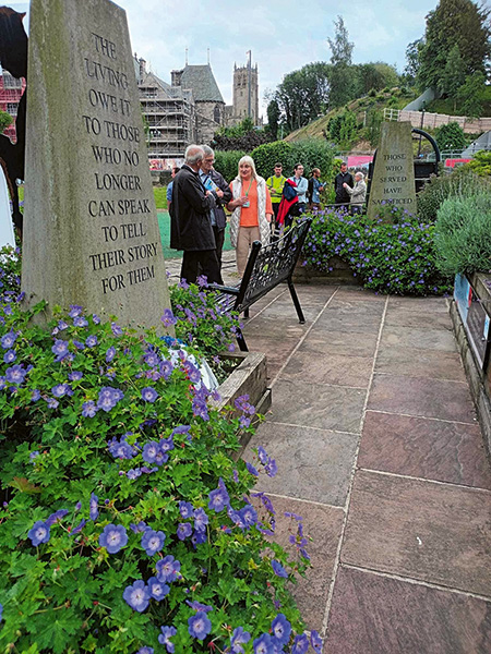 Louise Scott from Rochdale in Bloom with RHS judges at the WWI Memorial Garden in Rochdale town centre