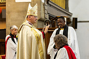 The Right Revd Mark Davies (Bishop of Middleton) blesses Revd Anne Gilbert at her licensing as Area Dean