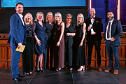 The registration team, winners of the pioneering for  change award with Luke O’Shaughnessy from A & T  Surfacing (left) and interim chief executive  of Rochdale Council Julie Murphy (second from left)